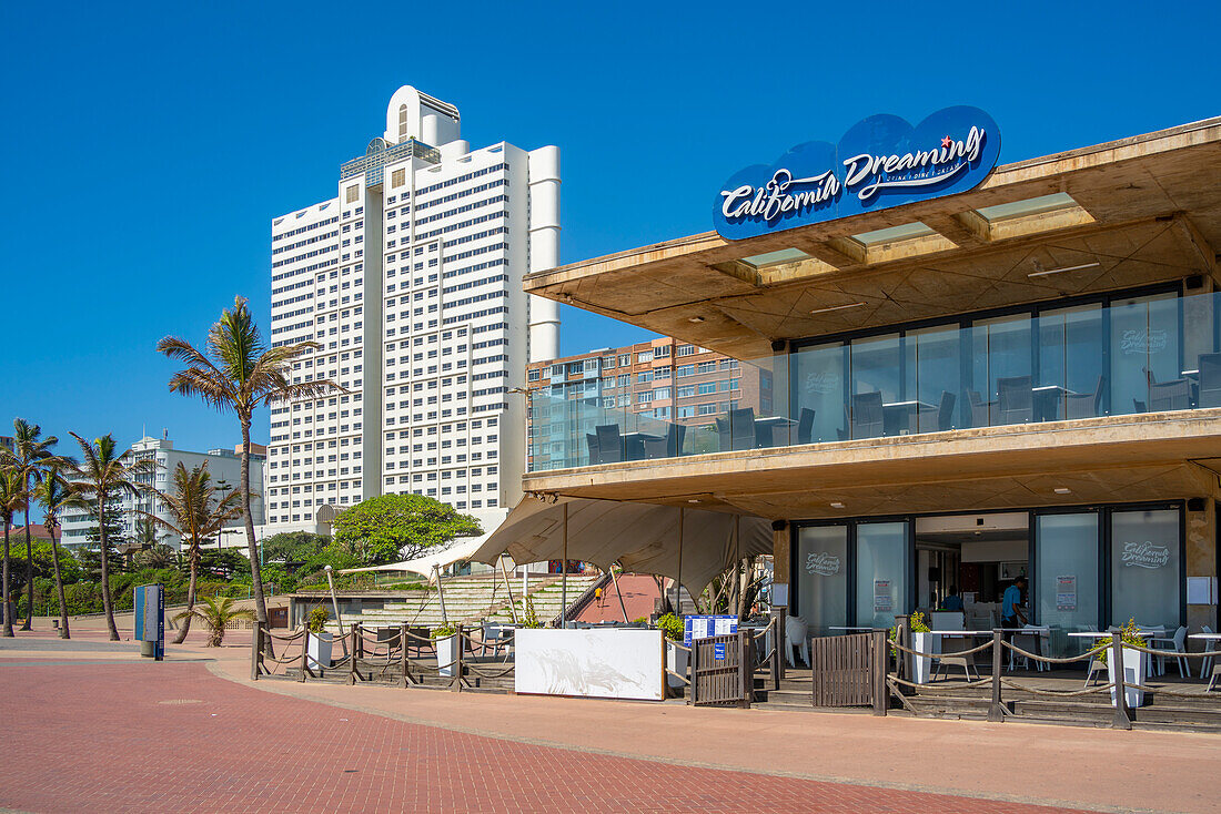 View of cafe and hotels on promenade, Durban, KwaZulu-Natal Province, South Africa, Africa