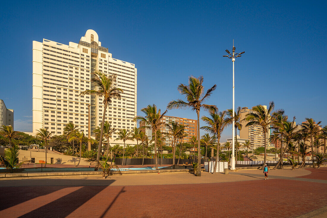 View of promenade and hotels at sunrise, Durban, KwaZulu-Natal Province, South Africa, Africa