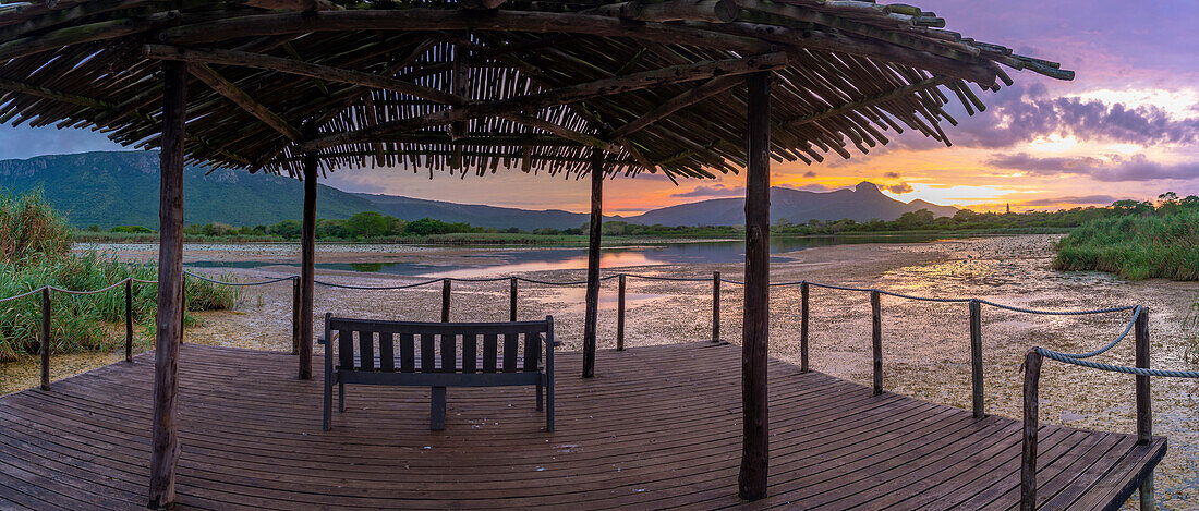 View of Jet lake and Ubombo Mountain from Ghost Mountain Inn at sunrise, Mkuze, KwaZulu-Natal Province, South Africa, Africa