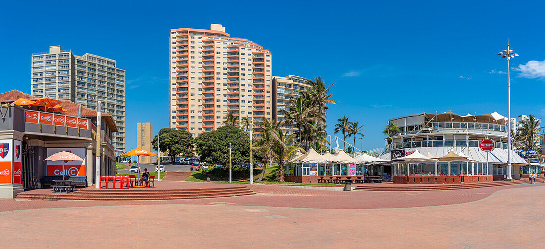 View of shops, restaurants and bars on promenade, Durban, KwaZulu-Natal Province, South Africa, Africa