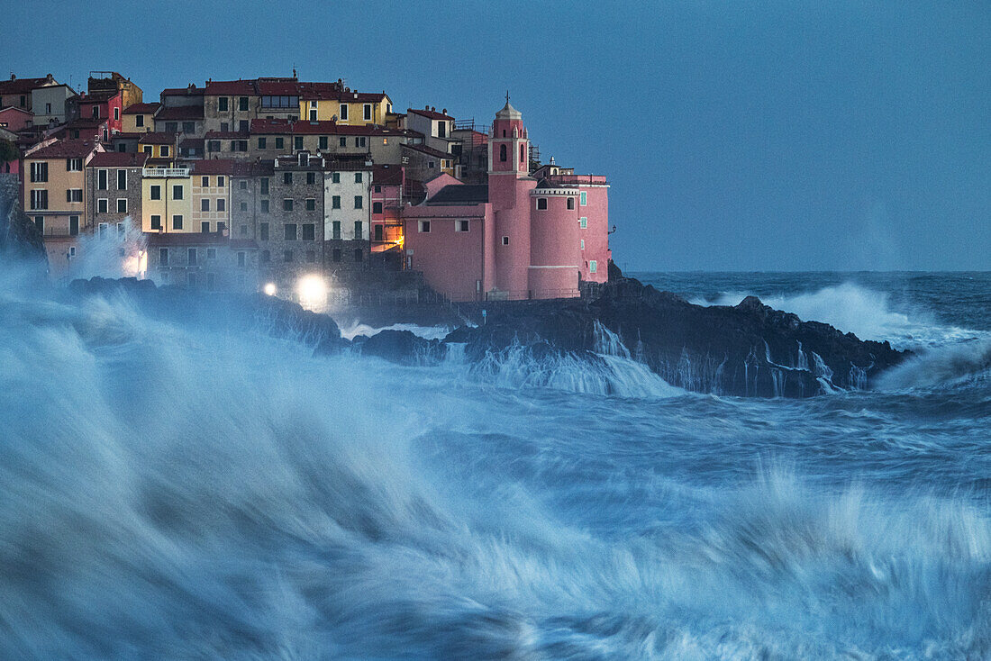 Big waves hit the famous fishing village of Tellaro during a strong sea storm, Lerici, La Spezia, Liguria, Italy, Europe