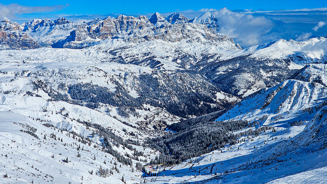 Snowy landscape with forest and mountains, Dolomites, Italy, Europe