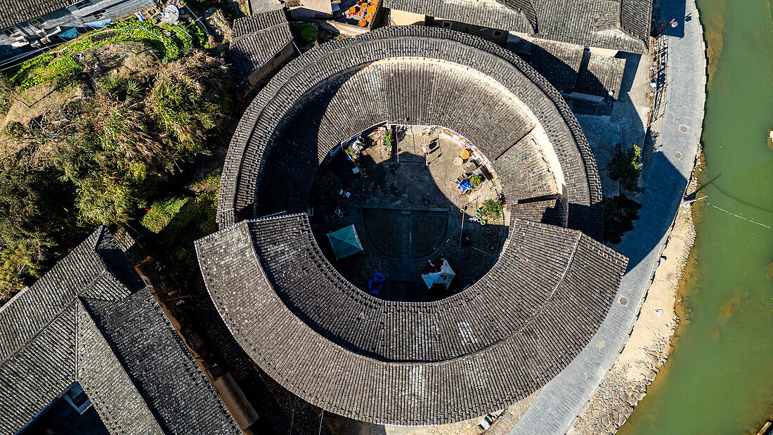 Aerial of Taxia village and Fujian Tulou, rural dwelling of the Hakka, Fujian, China, Asia