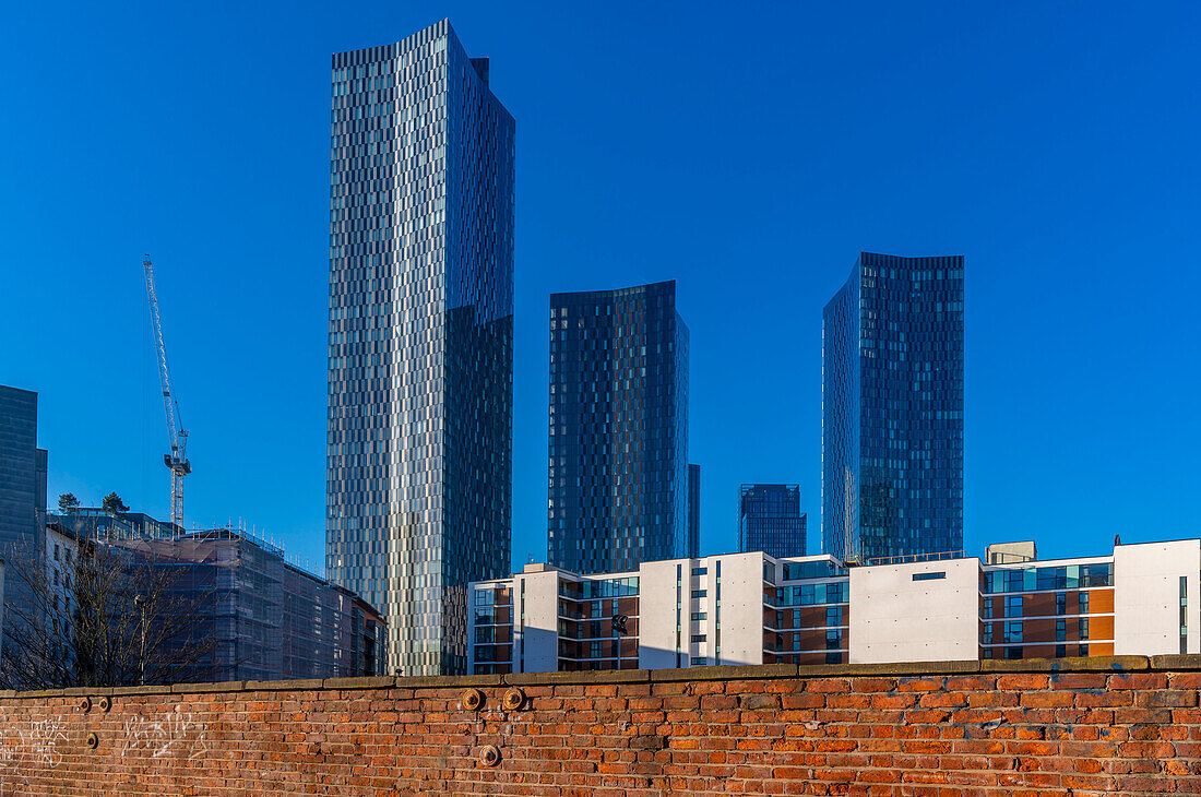 View of apartment buildings at Deansgate and crane, Manchester, Lancashire, England, United Kingdom, Europe