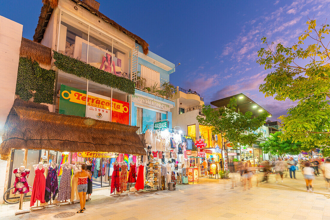 View of busy 5th Avenue at dusk, Playa del Carmen, Quintana Roo, Caribbean Coast, Yucatan Peninsula, Riviera Maya, Mexico, North America