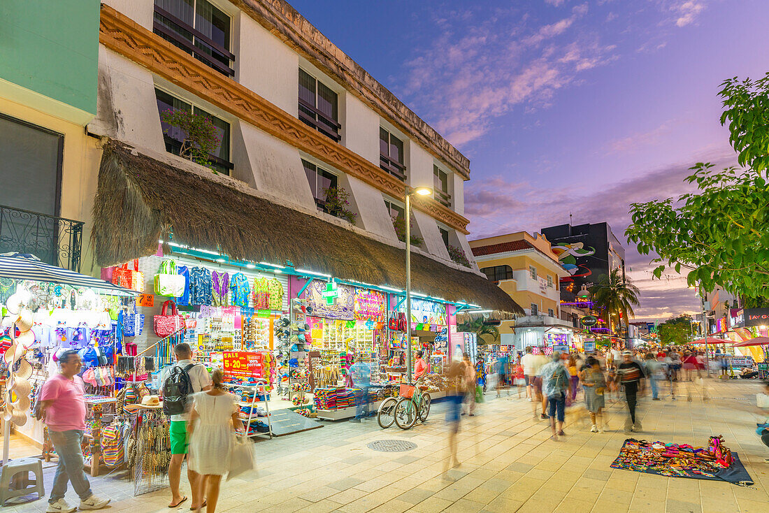 View of busy 5th Avenue at dusk, Playa del Carmen, Quintana Roo, Caribbean Coast, Yucatan Peninsula, Riviera Maya, Mexico, North America