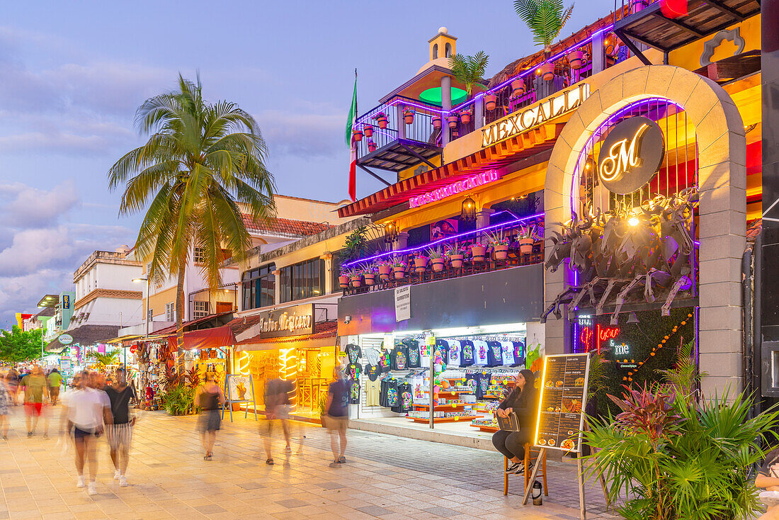 View of busy 5th Avenue at dusk, Playa del Carmen, Quintana Roo, Caribbean Coast, Yucatan Peninsula, Riviera Maya, Mexico, North America