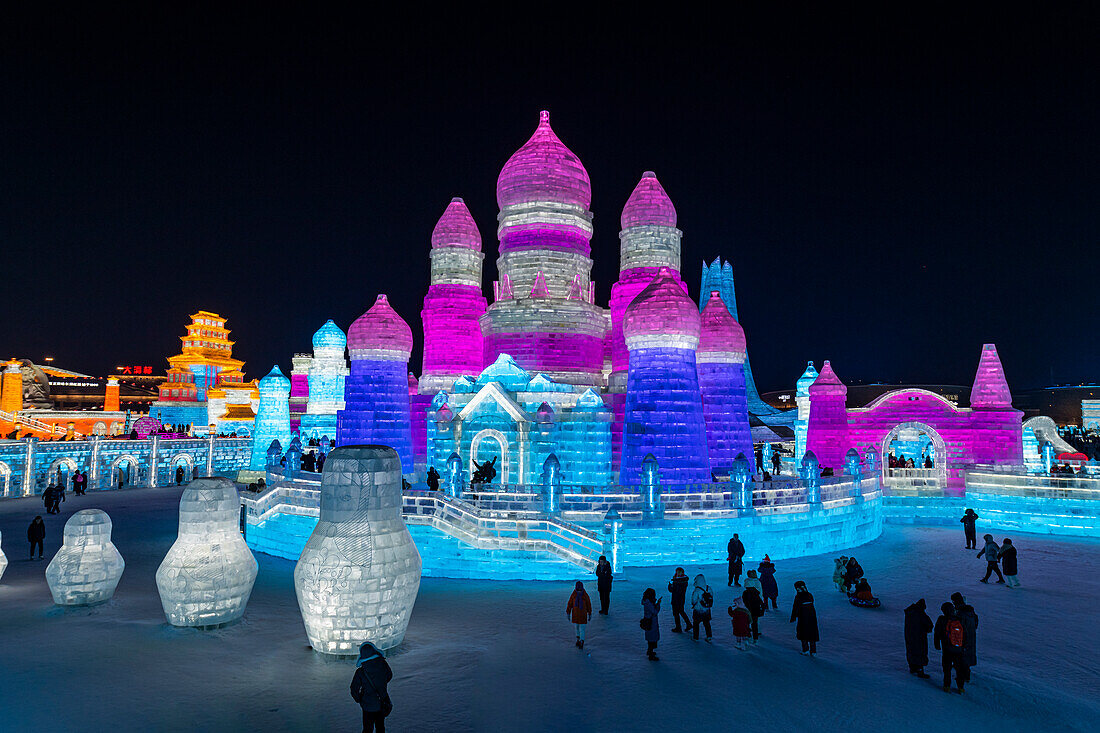 Illuminated buildings made out of ice, Ice International Ice and Snow Sculpture Festival, Harbin, Heilongjiang, China, Asia