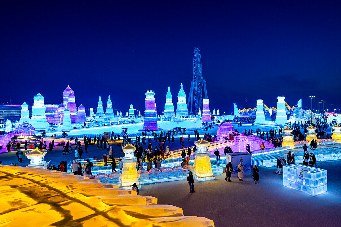 Illuminated buildings made out of ice, Ice International Ice and Snow Sculpture Festival, Harbin, Heilongjiang, China, Asia