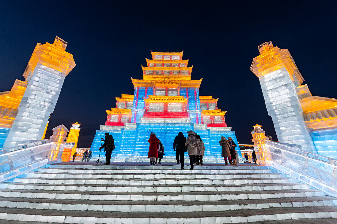 Illuminated buildings made out of ice, Ice International Ice and Snow Sculpture Festival, Harbin, Heilongjiang, China, Asia