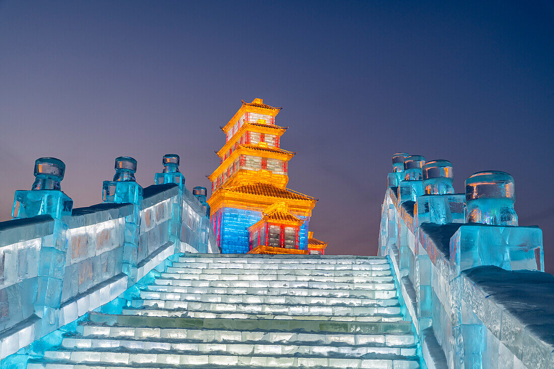 Illuminated buildings made out of ice, Ice International Ice and Snow Sculpture Festival, Harbin, Heilongjiang, China, Asia