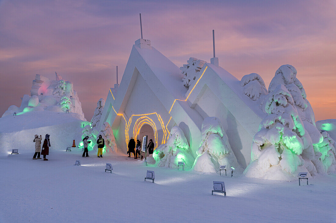 Illuminated buildings made out of ice, Ice International Ice and Snow Sculpture Festival, Harbin, Heilongjiang, China, Asia