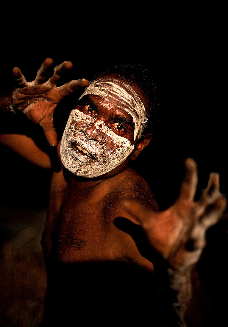 Aboriginal Yolngu man with tribal paint, often used when performing cultural dances, Nyinyikay Homeland, East Arnhem Land,Northern Territory, Australia, Pacific