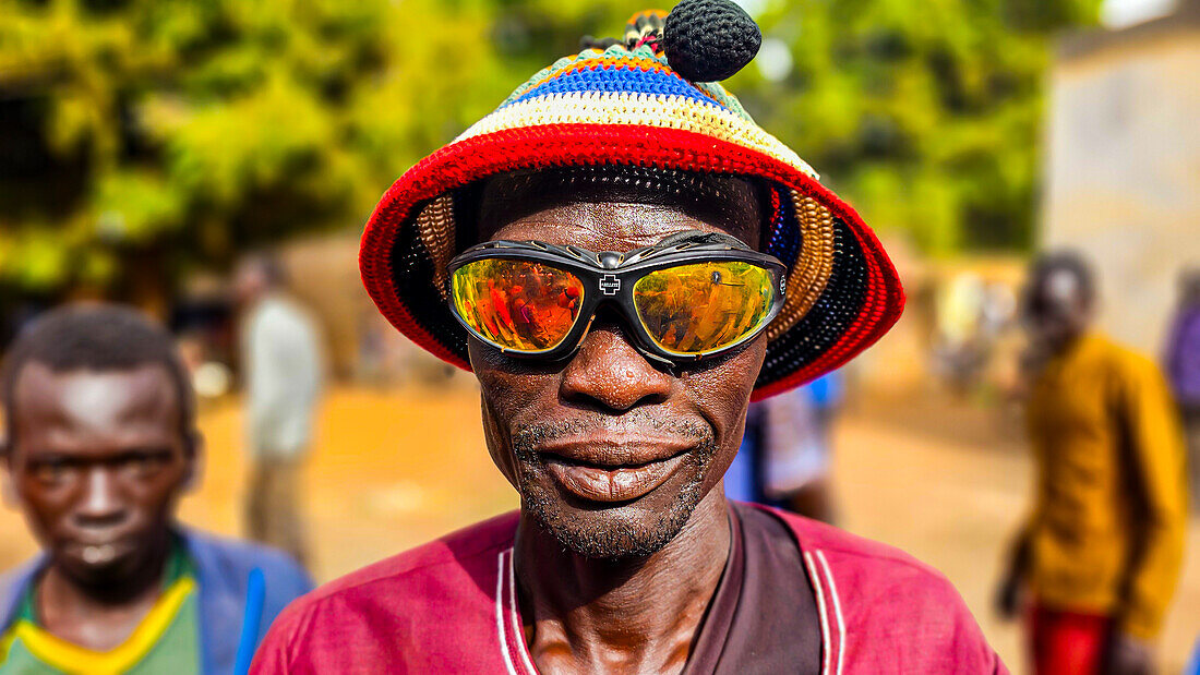 Interesting local man in sunglasses, Wau, Western Bahr el Ghazal, South Sudan, Africa