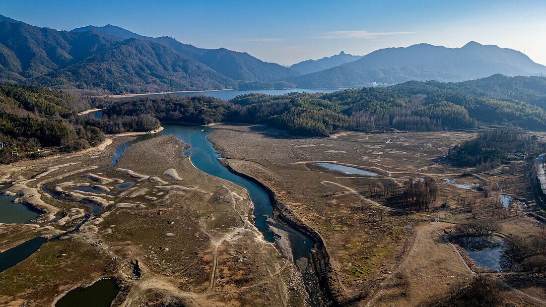 Aerial of hills and waterways near Hongcun historical village, UNESCO World Heritage Site, Huangshan, Anhui, China, Asia