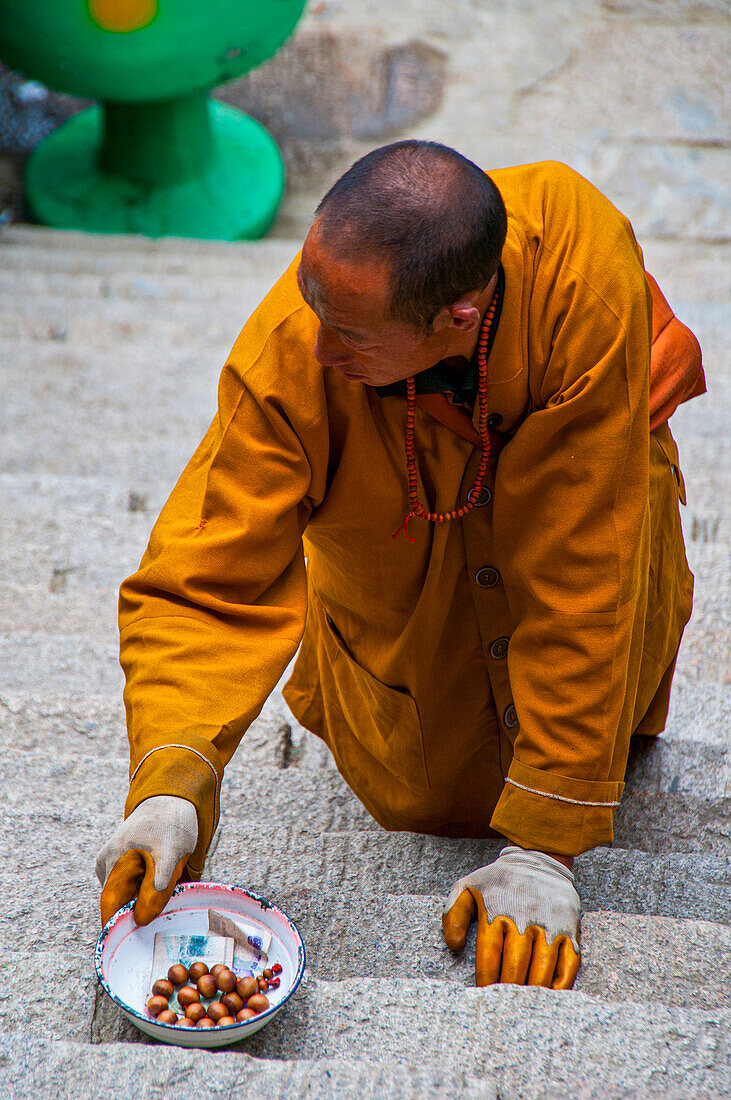 Pilgrims climbing up the mountain to the monastery complex of Wudai Shan (Mount Wutai), Shanxi, China, Asia