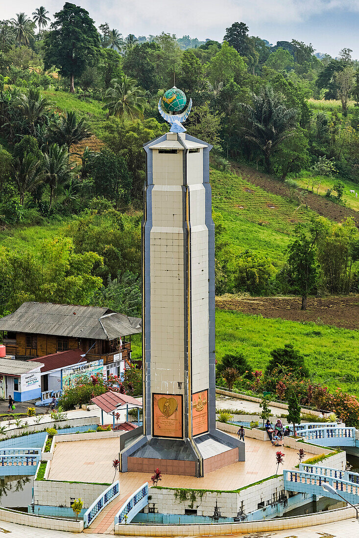 The world peace themed tower at this tourist park with worship houses of five major religions and volcanic fumarole fields, Bukit Kasih, Minahasa, North Sulawesi, Indonesia, Southeast Asia, Asia