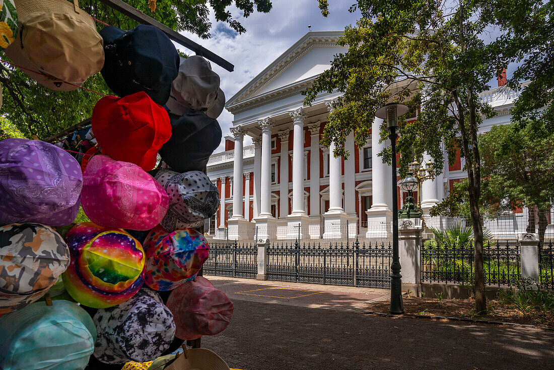 View of Parliament of South Africa Building and colourful hats for sale, Cape Town, Western Cape, South Africa, Africa