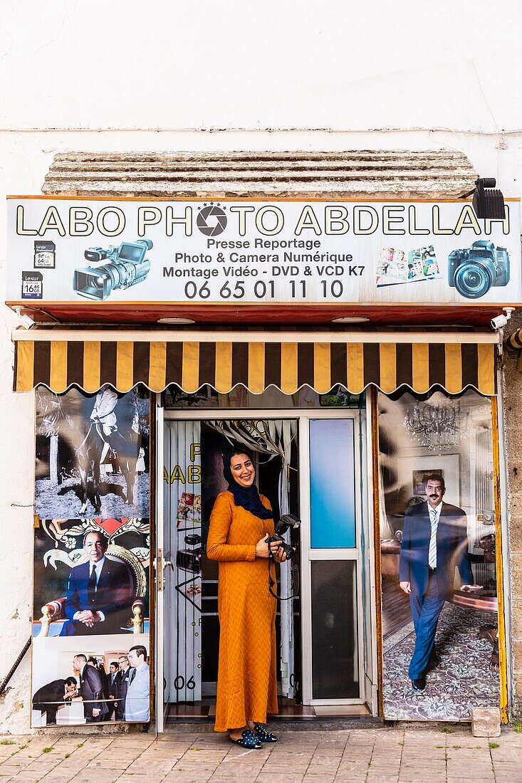 Morocco, Casablanca, Habous district, Zineb in front of his photographe shop