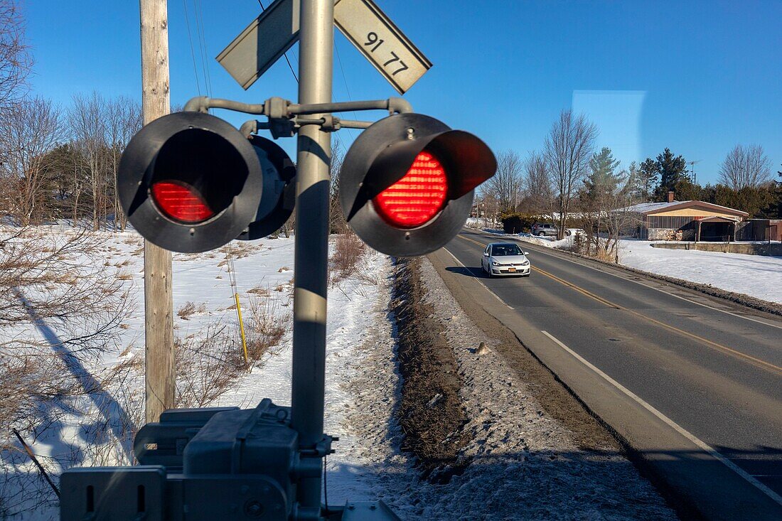 Canada, Quebec province, Via Rail train between Quebec and Montreal, Center-du-Québec region, level or railway crossing in the Drummondville area