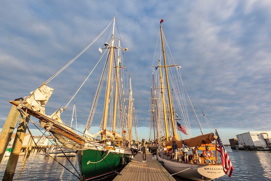 United States, New England, Massachusetts, Cape Ann, Gloucester, Gloucester Schooner Festival, schooners in Gloucester Harbor, dusk