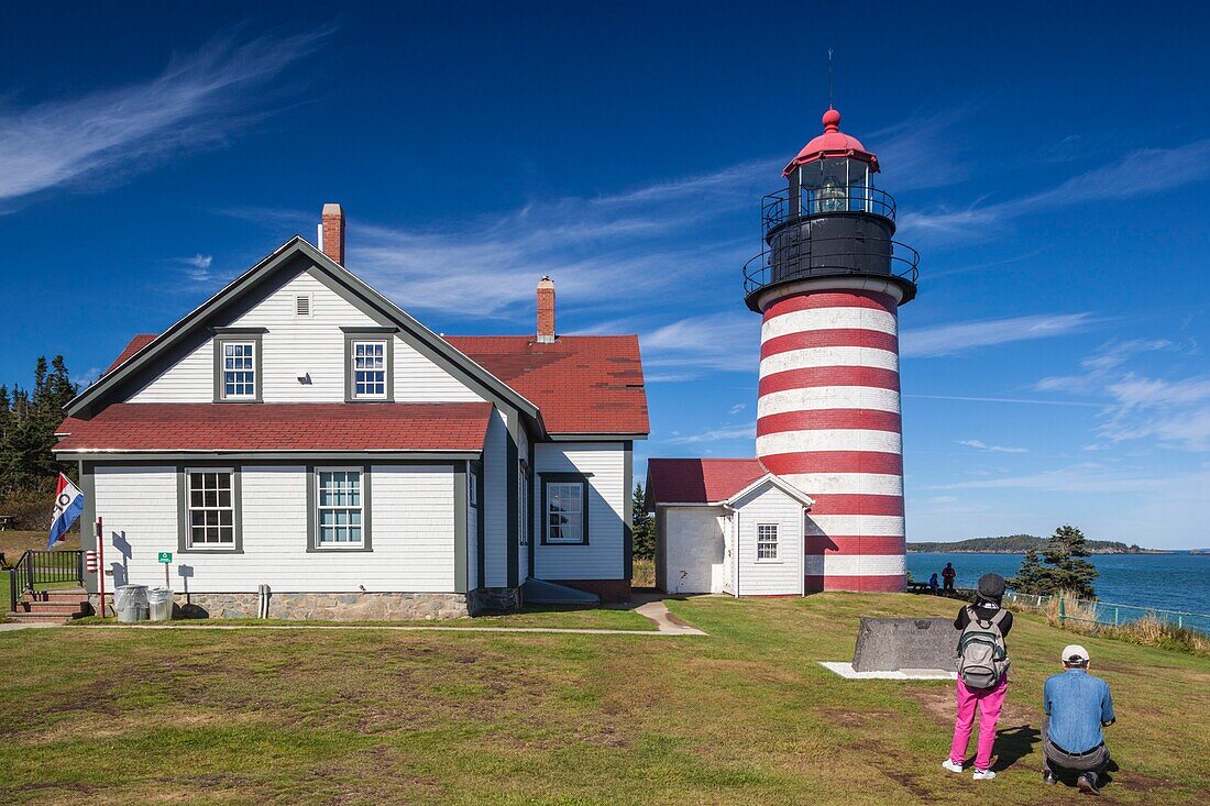 United States, Maine, Lubec, West Quoddy Head Llight lighthouse with visitors