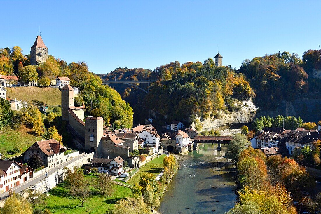 Switzerland, Canton of Fribourg, Fribourg, Sarine River (Saane River) banks, Gotteron tower gate and Bern wooden covered bridge