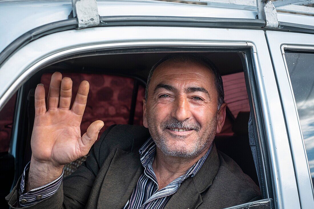 Armenia, Syunik region, Goris, smiling taxi driver