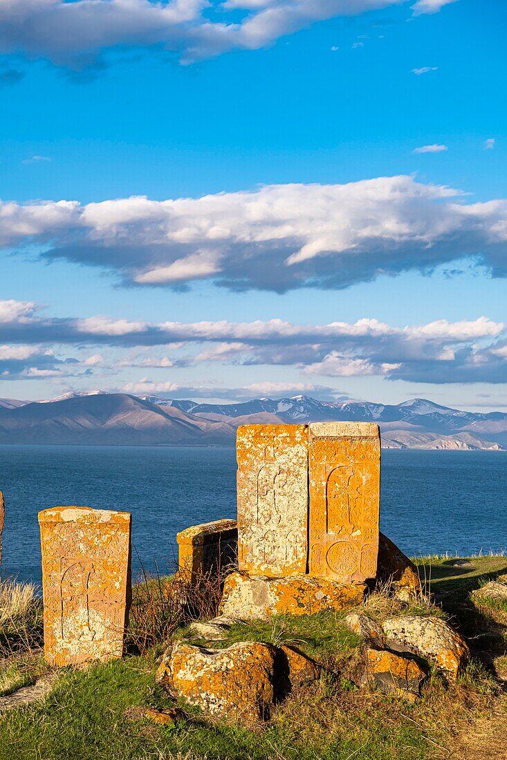 Armenia, Gegharkunik region, Hayravank, the 9th and 10th centuries Hayravank monastery built on a rocky promontory overlooking Sevan Lake, khatchkars (carved memorial steles)