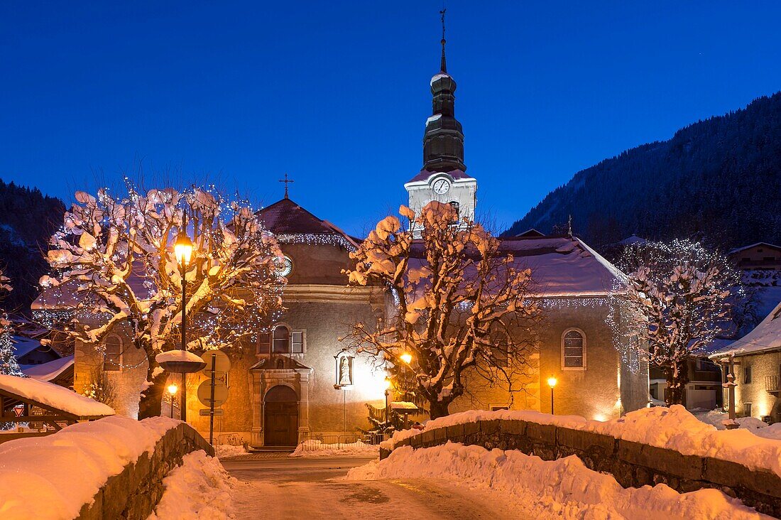 France, Haute Savoie, Massif du Chablais the doors of the sun Morzine the district of the church at dusk