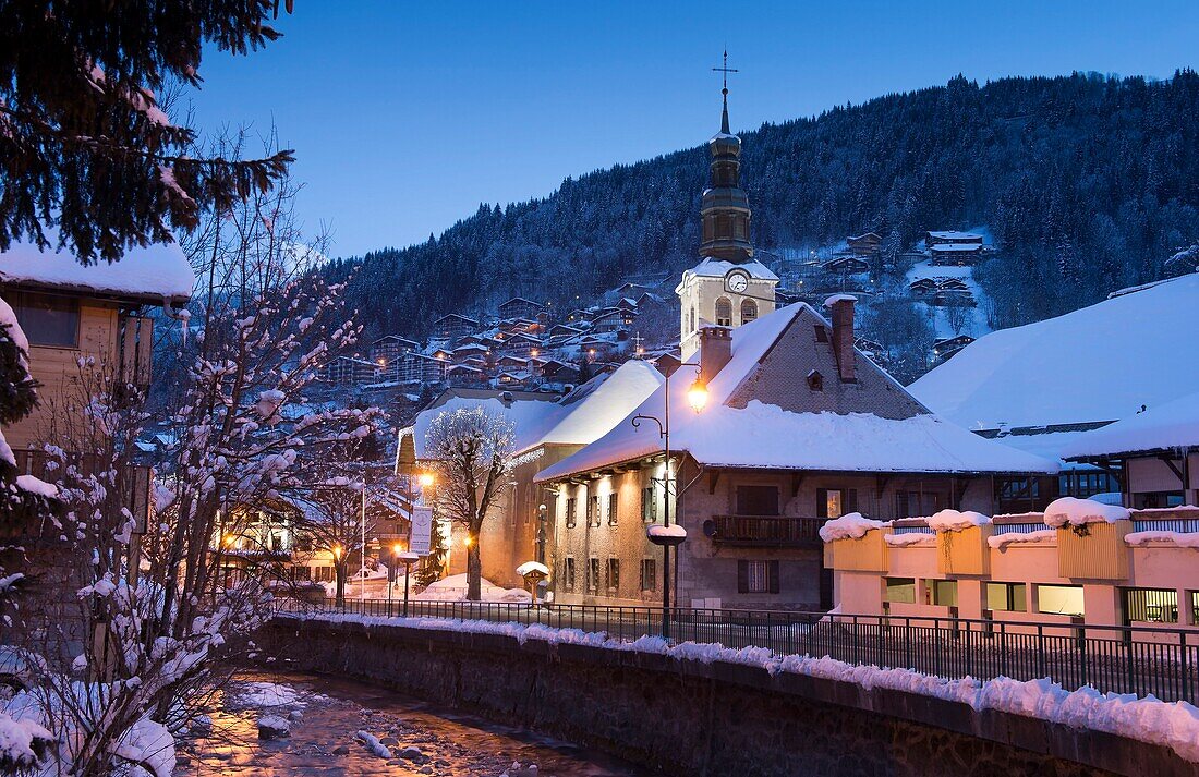 France, Haute Savoie, Massif du Chablais the doors of the sun Morzine the district of the church at dusk