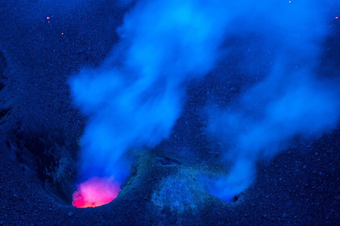 Italy, Sicily, Eolian Islands, Tyrrhenian sea, San Vincenzo, summit of Stromboli volcano 924 m, eruption of lava and projection of volcanic bombs from the central craters