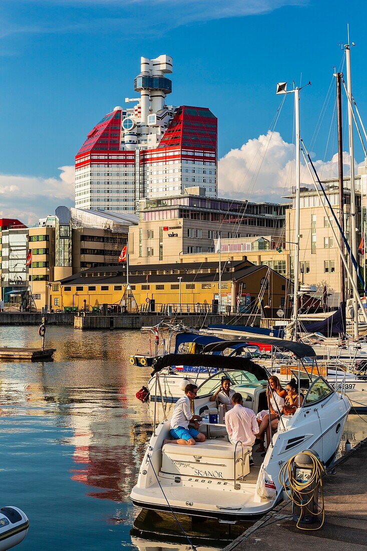 Sweden, Vastra Gotaland, Goteborg (Gothenburg), the skyscraper Gotheborgs-Utkiken and the sailing boat Viking in the port of Lilla bommen