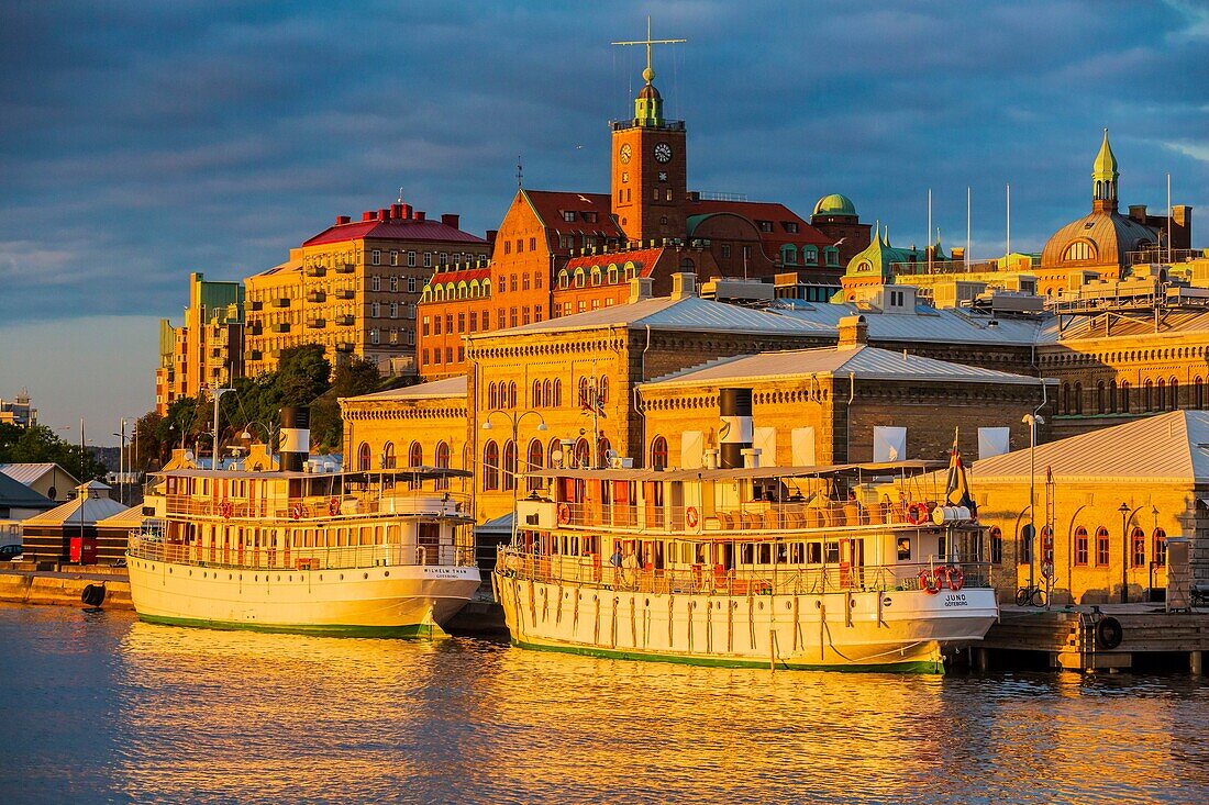 Sweden, Vastra Gotaland, Goteborg (Gothenburg), the roofs of the buildings of the company ASECO on Packhusplatsen and Kvarnberget and his clock