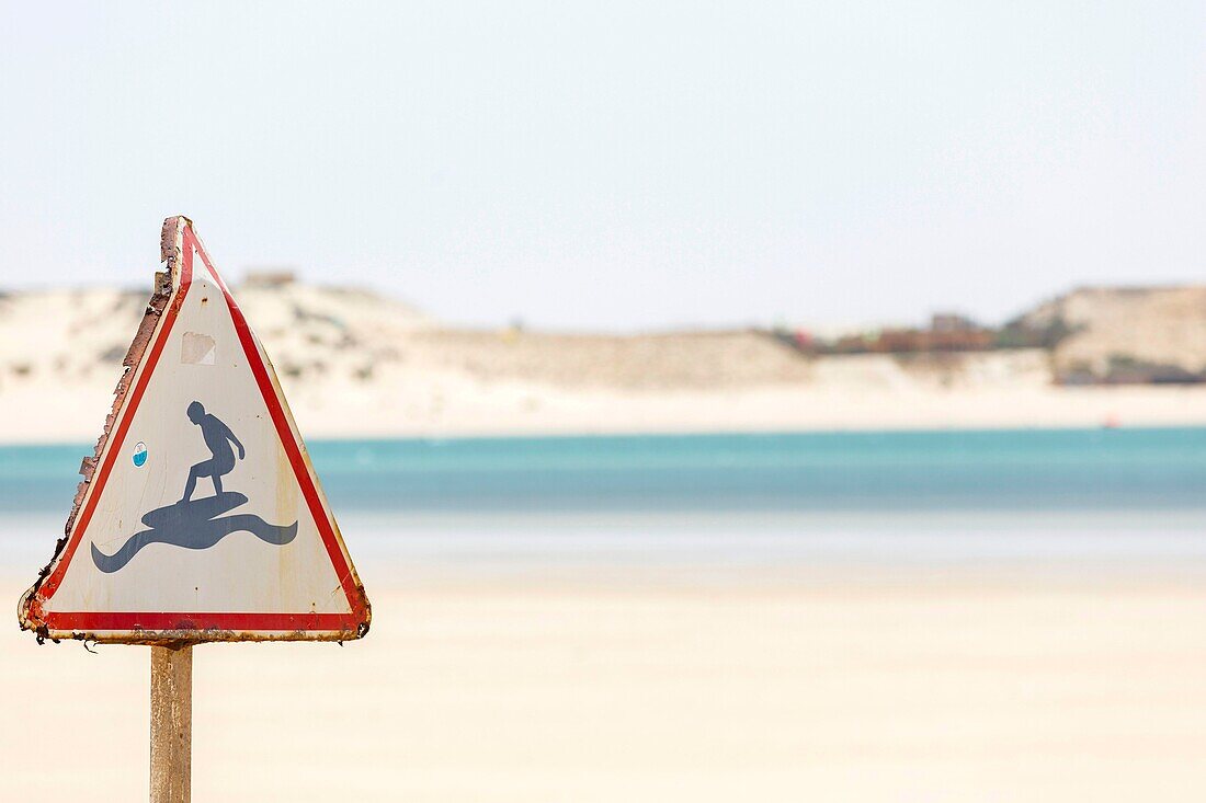 Marocco, Oued Ed-Dahab, Dakhla, road sign representing a surfer on a wave