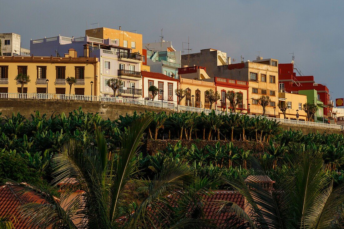 Spain, Canary Islands, La Palma, Tazacorte, view of a colonial style village at sunset