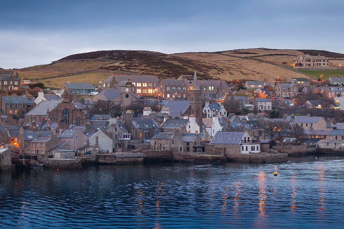 United Kingdom, Scotland, Orkney Islands, Mainland, Stromness, harbour at night, seen from departing ferry