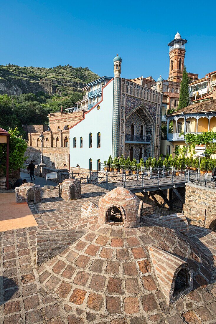 Georgia, Tbilisi, Old Tbilisi or Dzveli Kalaki, Abanotubani district or district of the sulfur baths, Orbeliani baths and the mosque of Tbilisi in the background