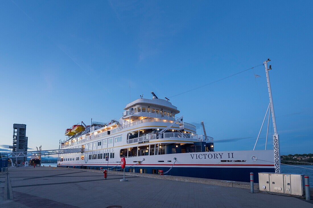 Canada, Quebec, Quebec City, Cruise Ship Victory 2 at Dock at Twilight