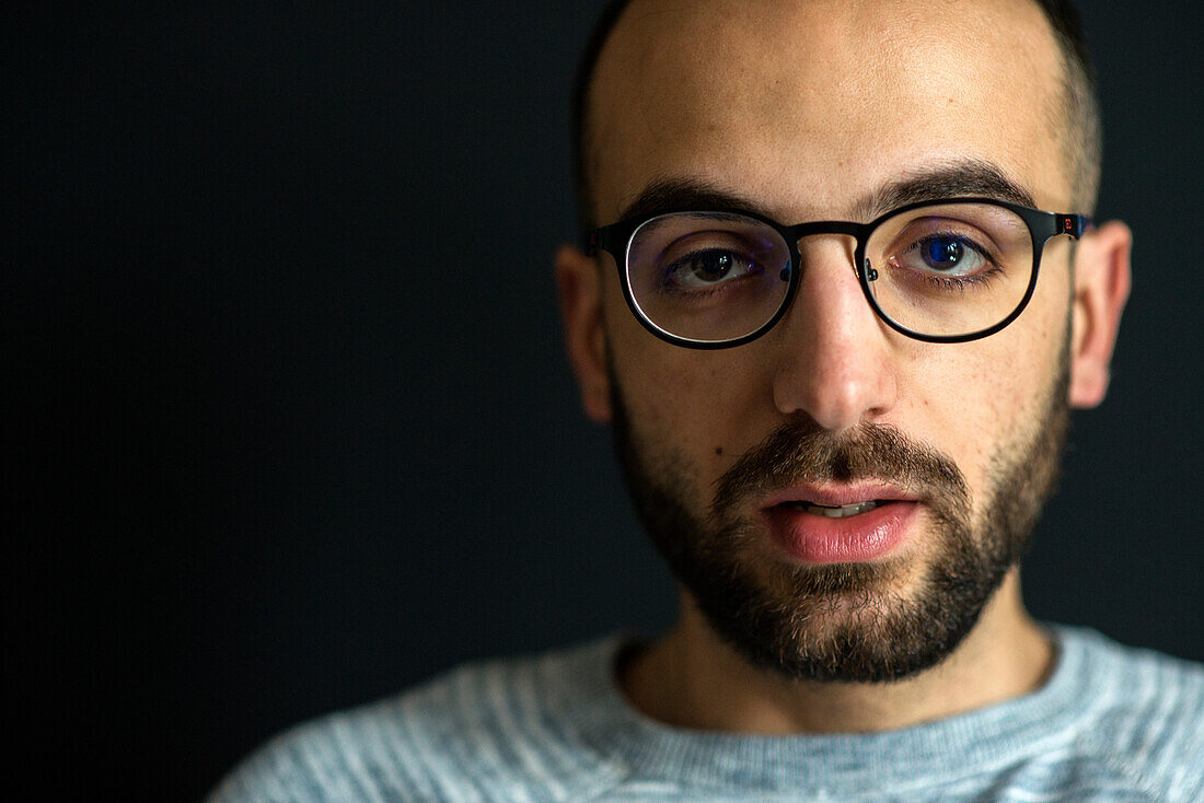 Tilburg, Netherlands. Studio shot portrait of Ammar, a Syrian refugee with valit and legal status to build his life in Holland.