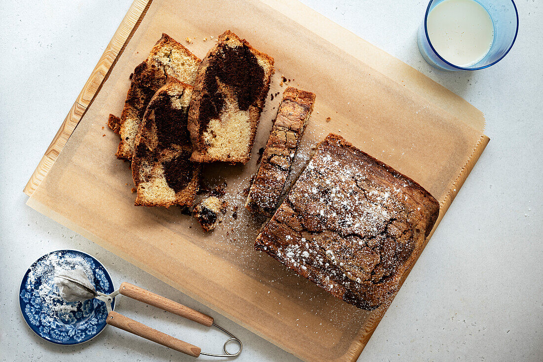 flat lay of a marble cake loaf on a light background