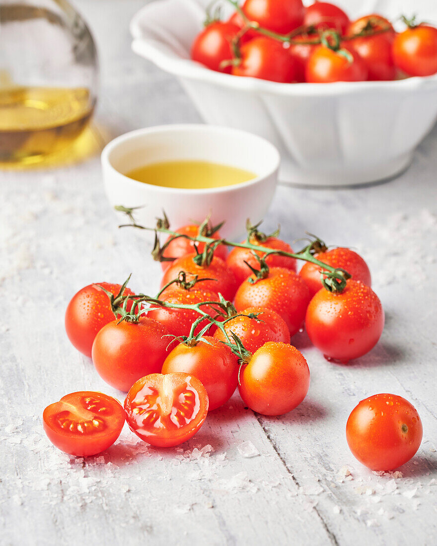 Fresh cherry tomatoes with sea salt and olive oil