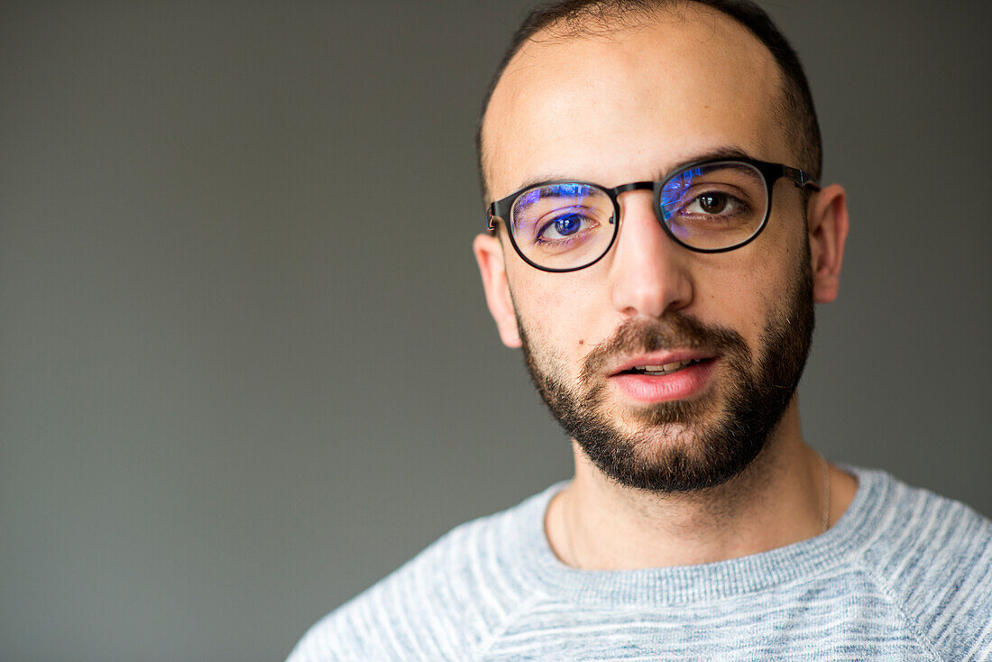 Tilburg, Netherlands. Studio shot portrait of Ammar, a Syrian refugee with valit and legal status to build his life in Holland.