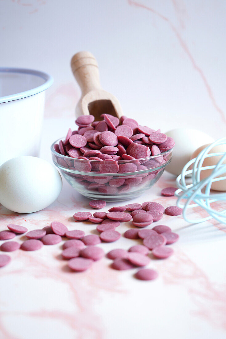 Ruby red chocolate made from selected botanical cocoa beans. Cooking concept with veal buttons.