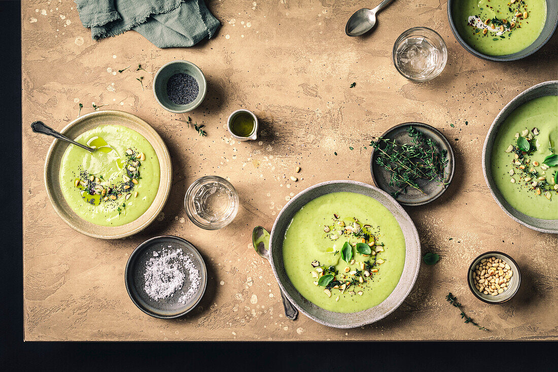 Green soup on brown background