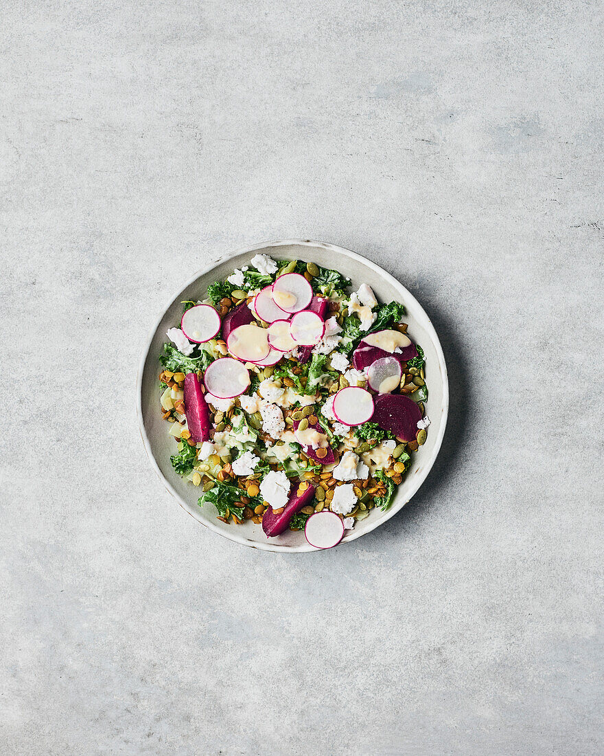 Beet and Kale Salad on a Grey Background