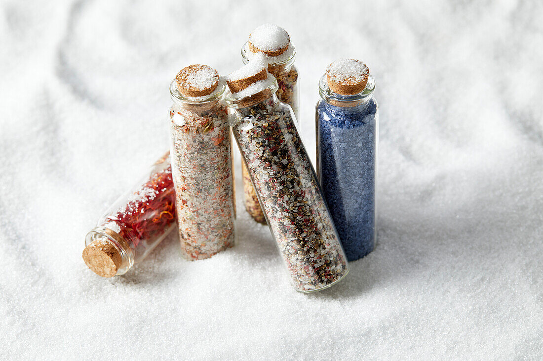 Various salt jars containing specialist salts for cooking