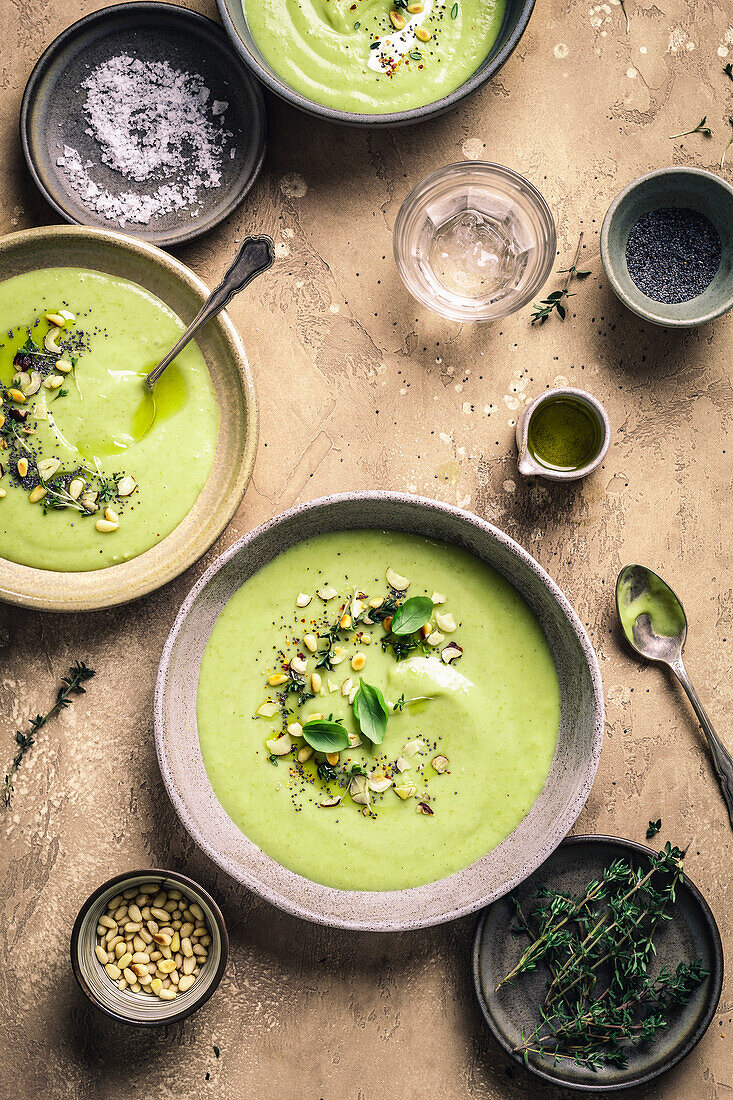 Green soup on brown background