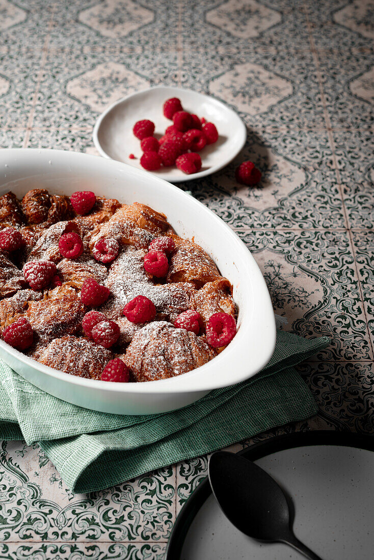 Caramel croissant pudding with fresh raspberries