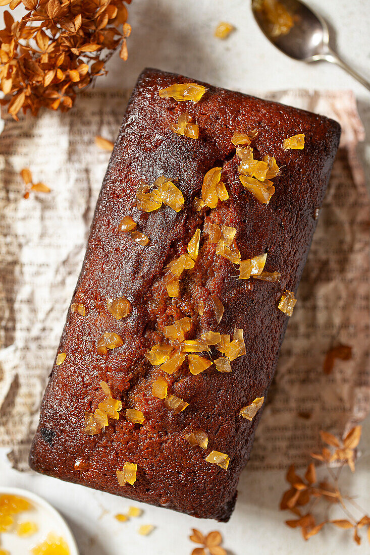 An uncut stem ginger loaf cake